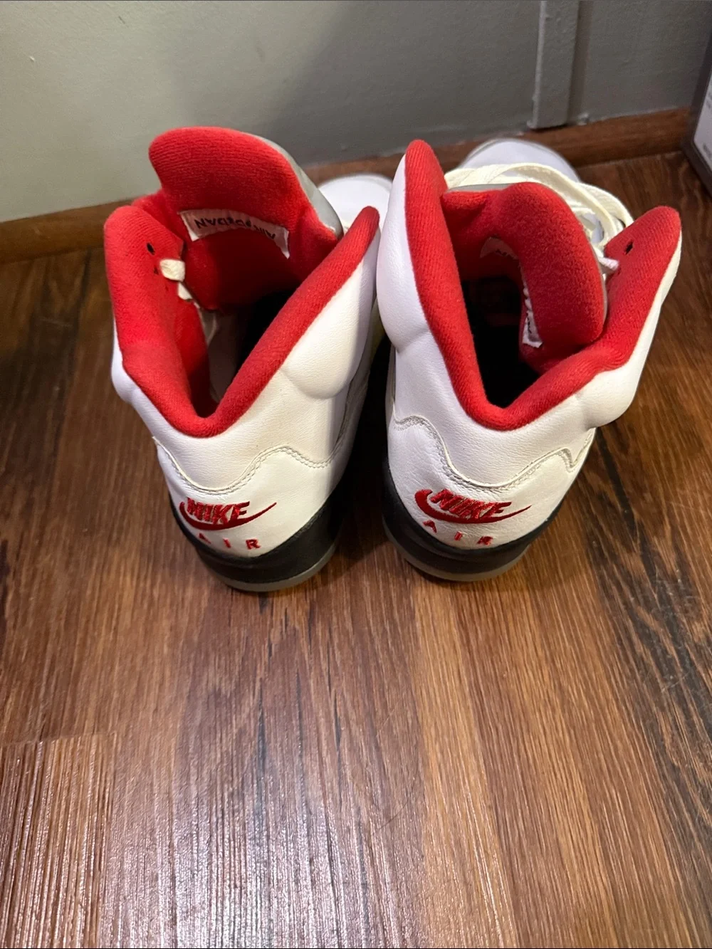 Nike Kids' White and Red Basketball Sneakers with Metallic Silver Tongue